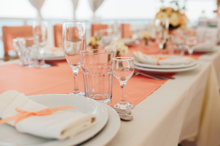 table set for wedding or another catered event dinner ceremonyの写真素材