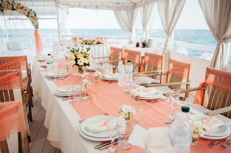 table set for wedding or another catered event dinner ceremonyの写真素材