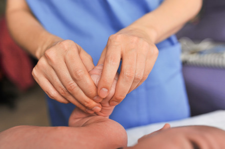 doctor makes small baby kid massage healthy.