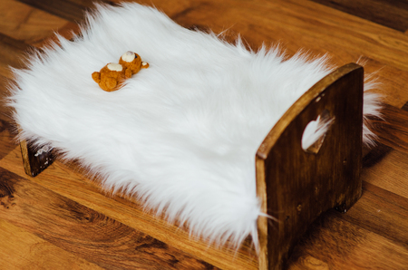 Baby cot for newborns with a toyの写真素材