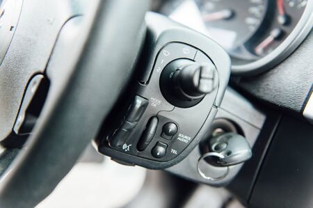 Car inside. interior of a modern white car. Additional controls