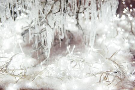 blurred of silver glittering shine bulbs lights