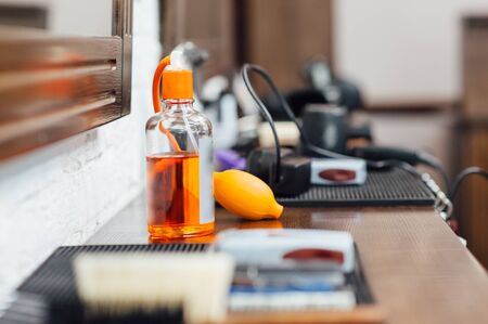 Mens hairdressing desktop with tools for shavingの写真素材