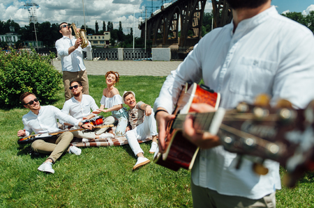 group of musicians playing musical instrumentsの写真素材