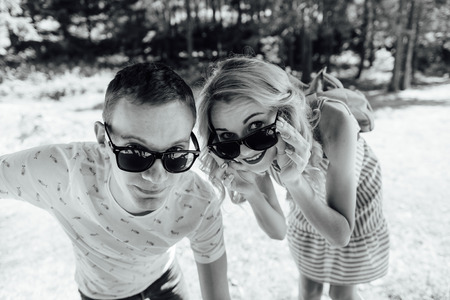 Couple in love walking in the mountains, having funの写真素材