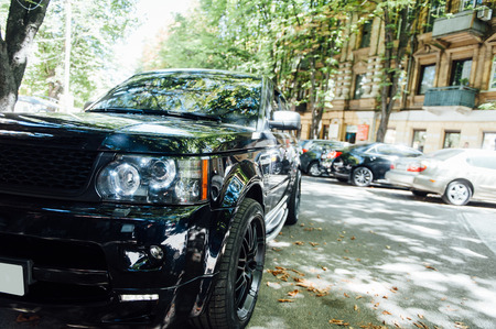 Premium SUV headlights in black with reflection.の写真素材