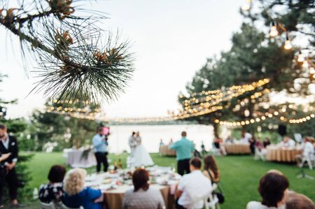 Light bulb decor in outdoor party, Wedding partyの写真素材
