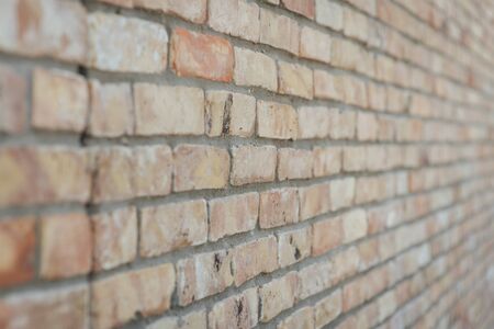 Brown brick wall background and texture vintage styleの写真素材