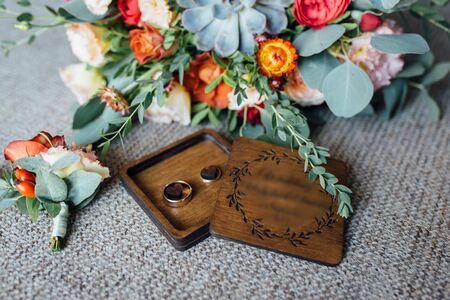 Wedding floristics and details. Wedding invitations on floor.の写真素材