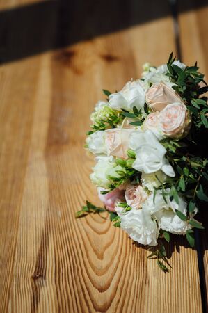 Wedding bouquet from beautiful flowers: pink roses, white and pink ranunculusの写真素材
