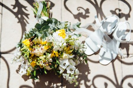 Wedding bouquet from beautiful flowers: pink roses, white and pink ranunculusの写真素材