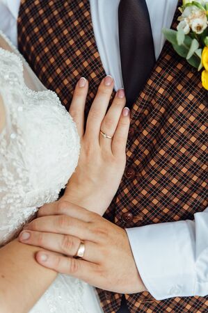 Young wedding couple outdoor. Groom and bride togetherの写真素材