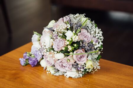 Wedding bouquet from beautiful flowers: pink roses, white and pink ranunculusの写真素材