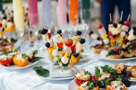 catering services background with snacks on guests table in restaurant at event partyの写真素材