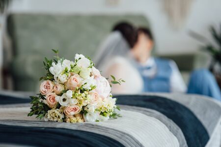 Wedding bouquet from beautiful flowers: pink roses, white and pink ranunculusの写真素材