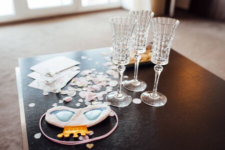 Table set for bachelorette party with glasses of champagneの写真素材