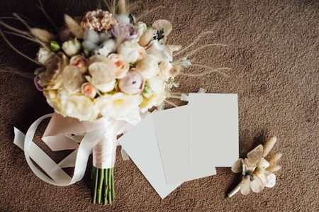 Wedding bouquet from beautiful flowers: pink roses, white and pink ranunculusの写真素材