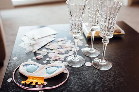 Table set for bachelorette party with glasses of champagneの写真素材