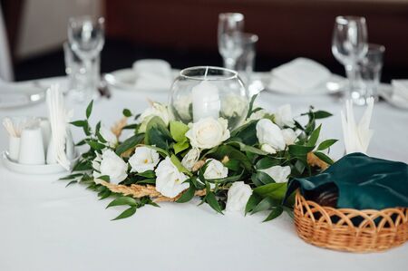 Luxurious wedding presidium in white with silver elements.