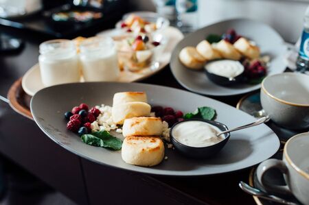 delicious breakfast for two on bed at the luxury hotel.の写真素材