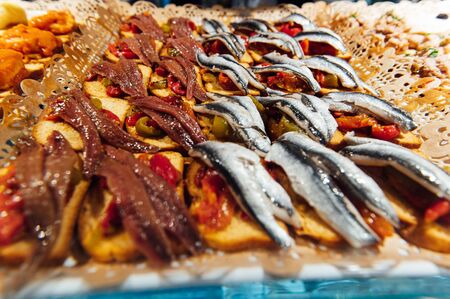 A wide variety of traditional tapas with seafood in Spain at the San Miguel market .の写真素材