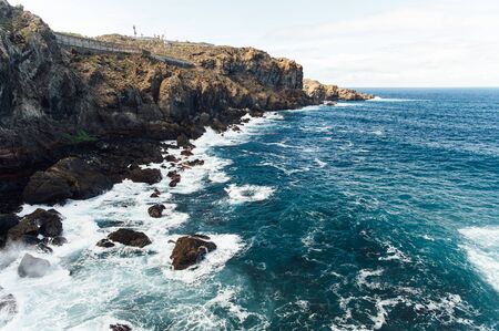 A powerful storm in the Atlantic Ocean in a bay on the coast of Tenerife.の写真素材