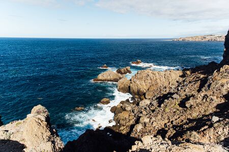 Breaking waves on the coast of Tenerife island, Canary islands, Atlantic ocean, Spainの写真素材