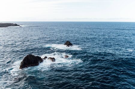 Breaking waves on the coast of Tenerife island, Canary islands, Atlantic ocean, Spainの写真素材