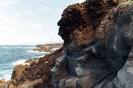 Breaking waves on the coast of Tenerife island, Canary islands, Atlantic ocean, Spainの写真素材