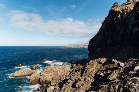 Scenic view of the Atlantic Ocean waves and rocky shore - a view from Anaga parkの写真素材