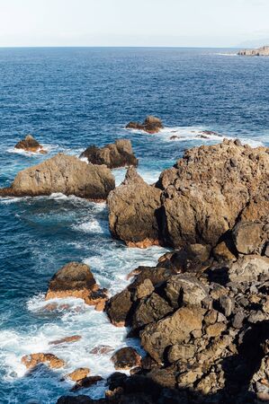 Scenic view of the Atlantic Ocean waves and rocky shore - a view from Anaga parkの写真素材