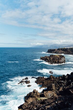 Breaking waves on the coast of Tenerife island, Canary islands, Atlantic ocean, Spainの写真素材