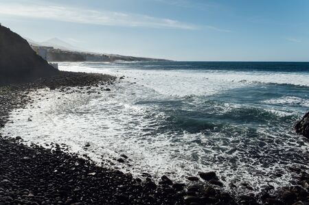 Waves on the rocky coast of Tenerife island, Canary islands, Atlantic ocean, Spainの写真素材