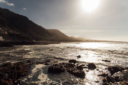 Waves on the rocky coast of Tenerife island, Canary islands, Atlantic ocean, Spainの写真素材