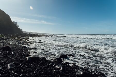 Waves on the rocky coast of Tenerife island, Canary islands, Atlantic ocean, Spain.の写真素材