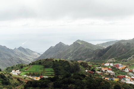 Small settlements between the mountain peaks on the Spanish island of Tenerife.の写真素材