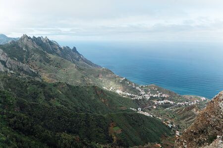 Small settlements between the mountain peaks on the Spanish island of Tenerifeの写真素材