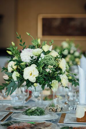 wedding decor, flowers, black and gold decor, candlesの写真素材