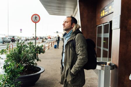 A young tourist is full of strength and energy in a new country. The journey starts.