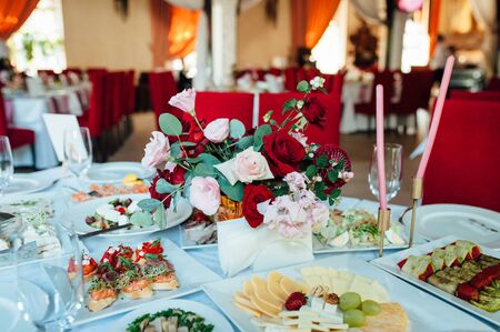Luxurious wedding presidium in white with red elements.の写真素材