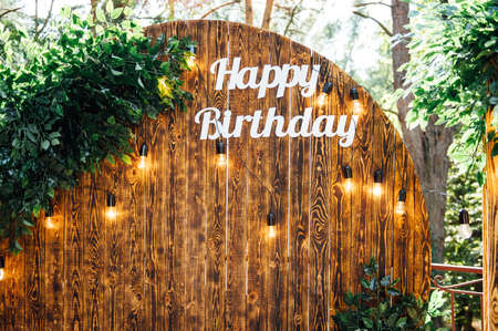 Round wooden arch, photo zone for a photo shoot for a 50th anniversary manの写真素材