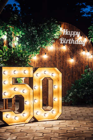 Round wooden arch, photo zone for a photo shoot for a 50th anniversary manの写真素材