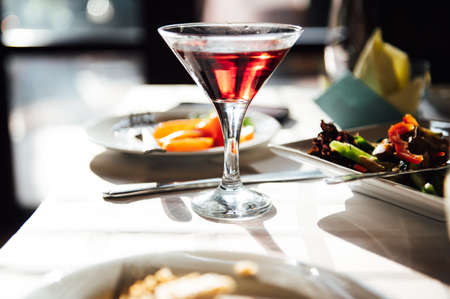 catering services background with snacks and glasses of wine on bartender counter in restaurantの写真素材