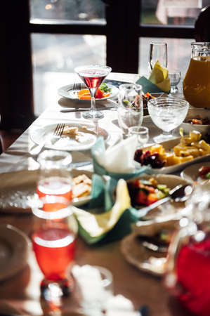 catering services background with snacks and glasses of wine on bartender counter in restaurantの写真素材