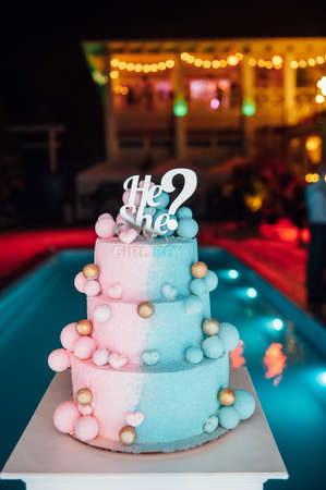 Big and delicious pink and blue baby gender reveal party cakeの写真素材