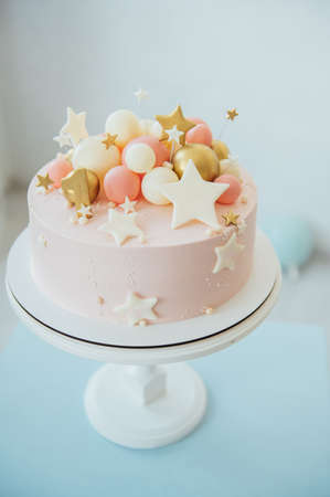 Colorful decoration of a first year birthday cakeの写真素材