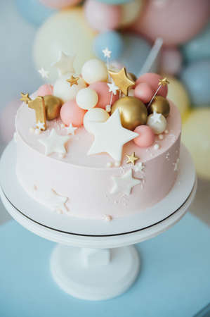 Colorful decoration of a first year birthday cakeの写真素材