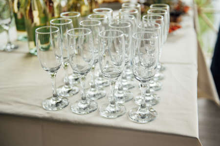 Glasses of champagne at the Banquet, white sparkling wine in wine glasses, festive moodの写真素材