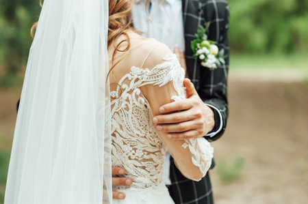 Bride and groom at wedding Day walking Outdoors on spring nature.の写真素材