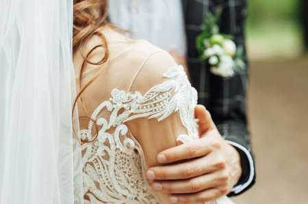 Bride and groom at wedding Day walking Outdoors on spring nature.の写真素材
